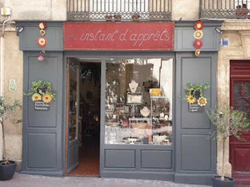 L'Instant d'Apprêts — Écusson